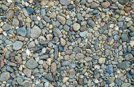 Pebbles on the beach. Texture of pebbles.の写真素材