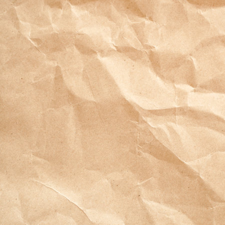 Recycled crumpled brown paper texture or background for design with copy space for text or image.の写真素材