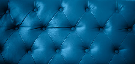 Close up of blue leather upholstery sofa texture background. Luxury furniture.の写真素材