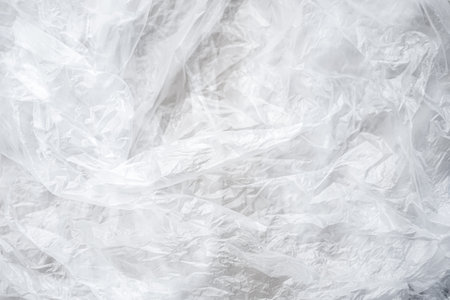 White plastic bag as background. Texture of crumpled fabric.の写真素材