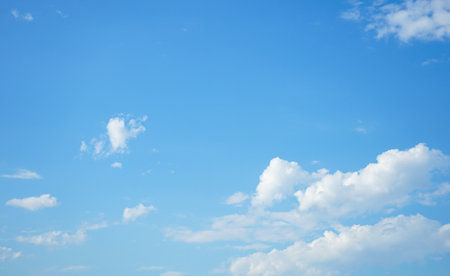 blue sky background with tiny clouds, soft focus, and copy spaceの写真素材