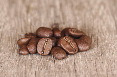 Coffee beans on wooden background. Close-up image.の写真素材