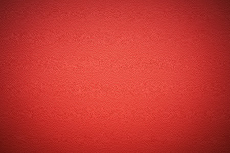 Red leather texture or background for design with copy space for text or image.の写真素材
