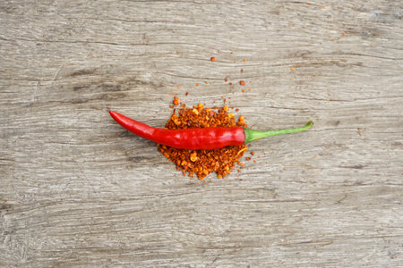 Chilli pepper on wooden background. Top view with copy space.の写真素材