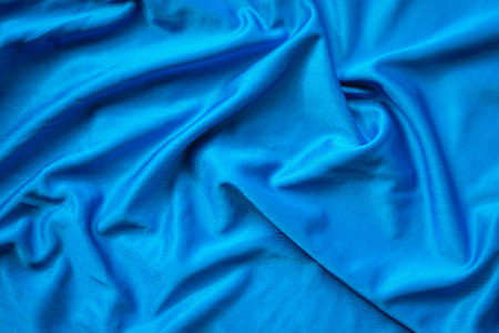 Blue satin fabric texture background. Top view. Close up.の写真素材