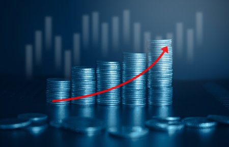Stacks of coins with red arrow up. Financial growth concept.の写真素材