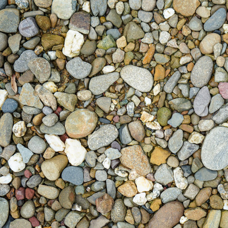 Colorful pebble stones on the beach. Background texture.の写真素材