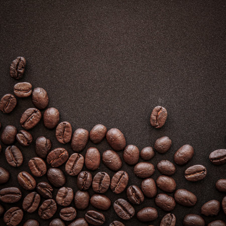 Coffee beans on black background, top view with copy spaceの写真素材