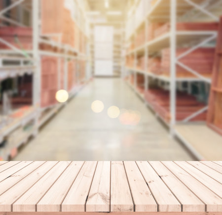 Wood Table Top And Blur Building Of The Background. For Your photomontage or product displayの写真素材