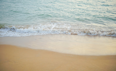 beach and tropical sea - soft wave of ocean on sandy beachの写真素材