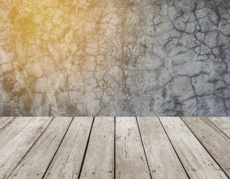 Wooden floor and concrete wall background with copy space for text.の写真素材