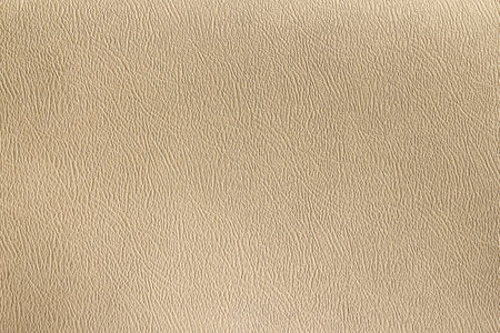 Close up of textured beige leather background. High resolution photo.の写真素材