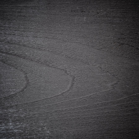 Black wood texture background surface with old natural pattern or old wood texture table top view. Grain surface with wood texture backgroundの写真素材