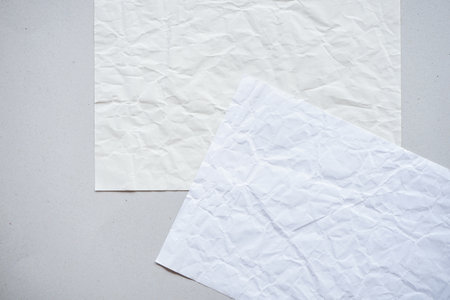 White crumpled paper on white background with copy space for textの写真素材