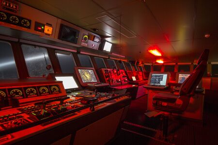 Bridge of a polar research vessel while cruising at night during a snow storm