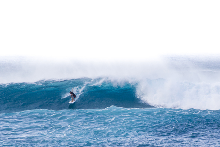 Banzai Pipeline, Oahu/Hawaii â€“February 27, 2017: A surfer riding barrels of the Banzai...