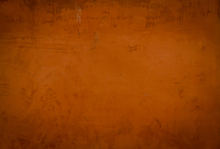 Red and grungy stucco wallの写真素材