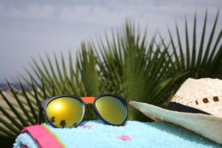Beach towel and sunglasses Playa las Vistasの写真素材