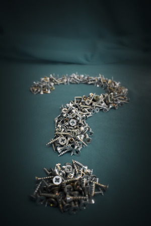 Pile of Screws Question Markの写真素材
