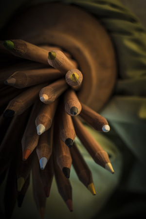 Pile of Color Pencils - Pile of Color Pencils in Dark Environmentの写真素材