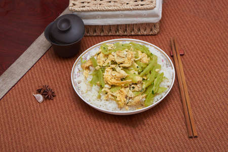 Classic Recipe Bitter Gourd Scrambled Egg Rice Bowlの写真素材