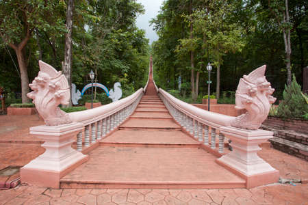 ancient stair with great naga at top of stairsの写真素材