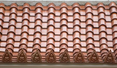 detail of a traditional clay roof at yanasangvararam temple, pattaya, thailand