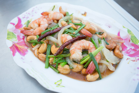shrimp fried with cashews on plateの写真素材