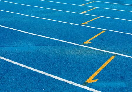 Numbers on blue running trackの写真素材