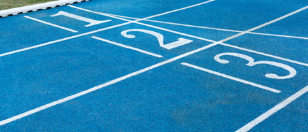Numbers on blue running track