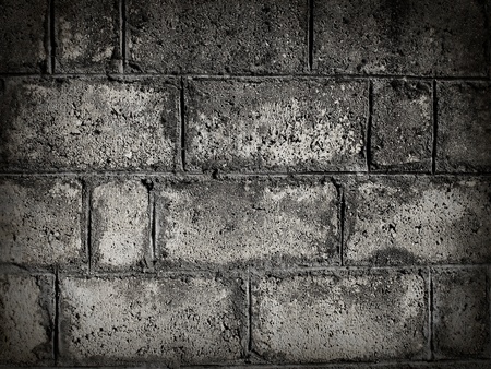 Stacked stone wall background in black and white