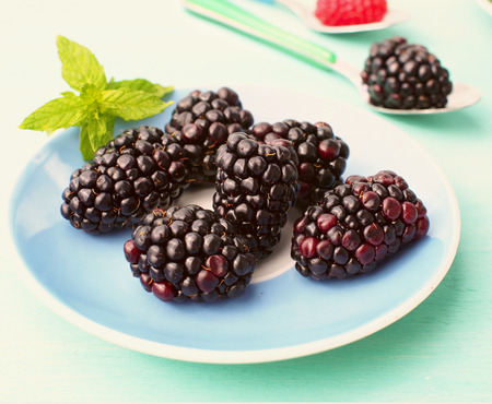 Blackberries on a plateの写真素材