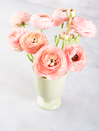 Beautiful pink ranunculus bouquet. Woman mother's day wedding. Holiday elegant bunch of flowers.の写真素材