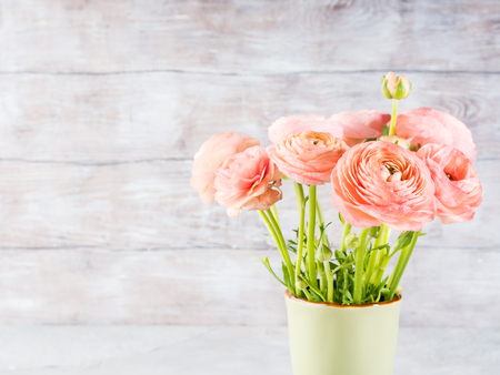 Beautiful pink ranunculus bouquet. Woman mother's day wedding. Holiday elegant bunch of flowers.の写真素材