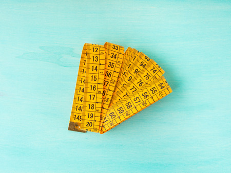 Measuring meter on green pastel backgroundの写真素材
