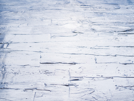 Dark blue acrylic painted wooden background. Sea water effect or wet road pavement