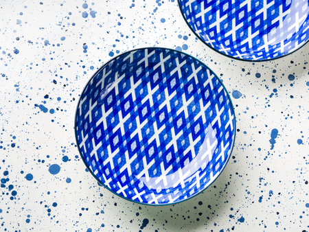 Empty porcelain china dish on white background. Copy spaceの写真素材
