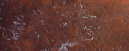 Abstract textured brown color concrete effect painted background