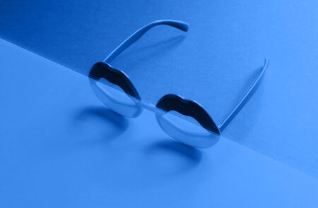 Lip shape glasses with classic blue gradient glitch. Vaporwave aesthetics conceptの写真素材