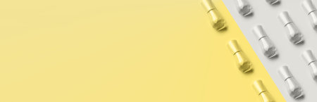 Gray nail polish pattern on illuminating yellow background. Duotone backdrop with trendy colors of the year. Web bannerの写真素材