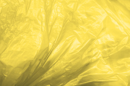 Illuminating yellow and gray plastic texture backgroundの写真素材