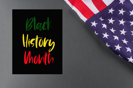 Black history month concept poster on black nackground with american flagの写真素材