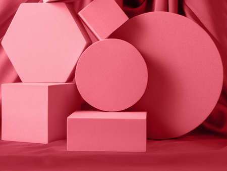 Geometric shapes pink coral stand podium mockup for product display on silk textile backgroundの写真素材