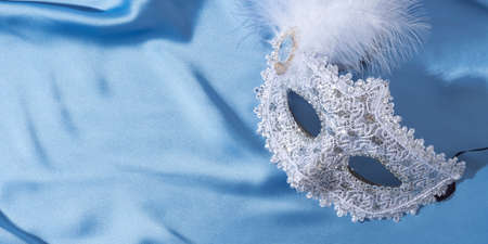 White venetian carnival mask with featherの写真素材