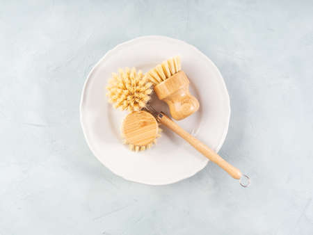 Zero waste plastic free reusable dish house washing wooden brushes as natural cleaning toolsの写真素材