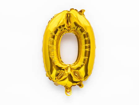 Number 0 golden foil balloon party decor on white background, baby birthday conceptの写真素材