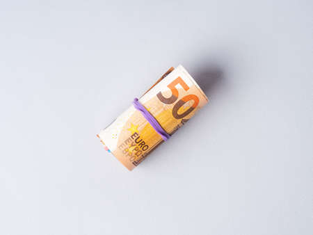 Euro 50 value banknotes roll with rubberの写真素材