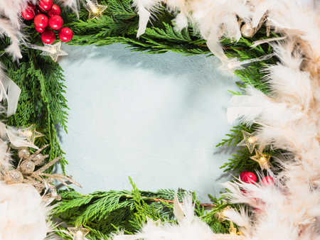 Green branches frame with star shape Christmas lights red decorの写真素材