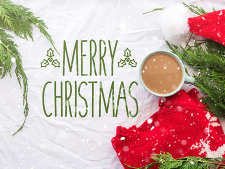 Merry Christmas greeting card with winter cozy coffee mugの写真素材
