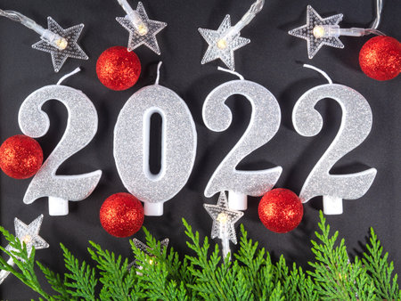 New year 2022 numbers on blackboard with star shape lights